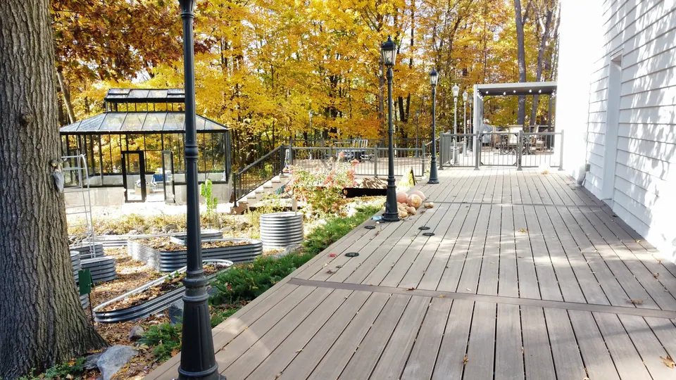 Finished composite deck with black aluminum railing
